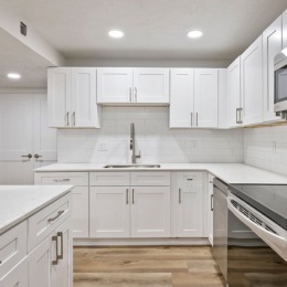 kitchen with white cabinets and stainless steel appliances