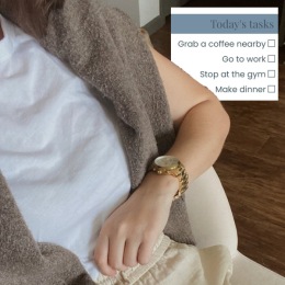 a person looking wearing a watch and a graphic