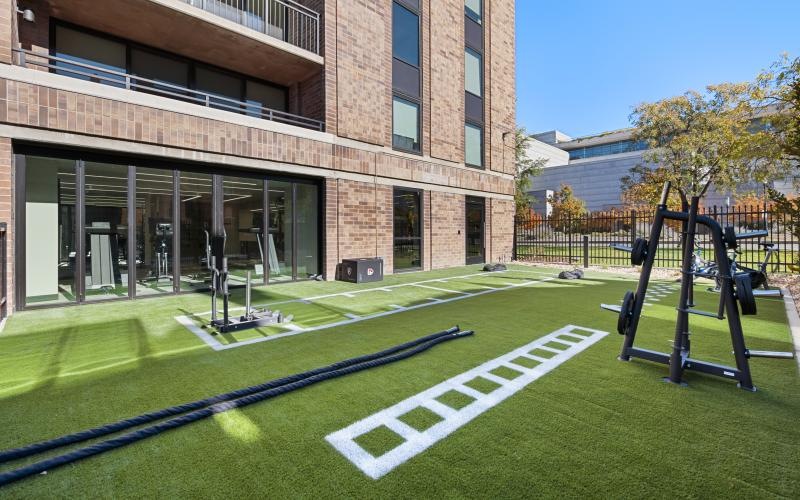 a basketball court in front of a building